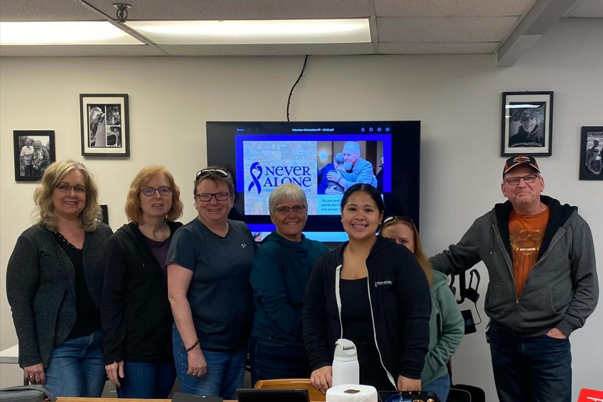 People and a volunteer intake session