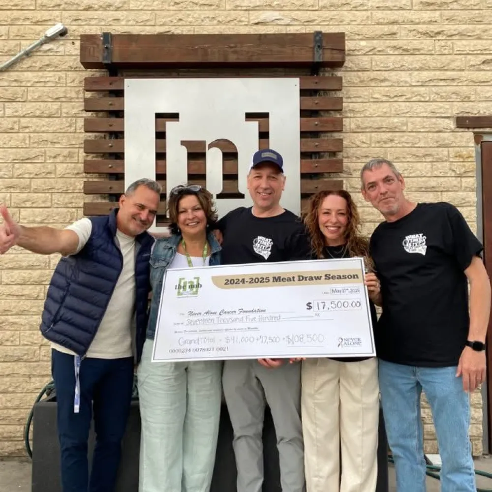 Photo of Nob crew with cheque